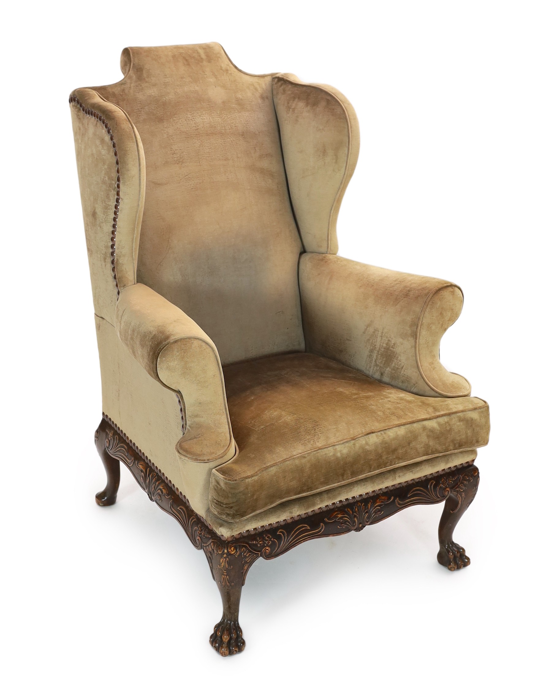 An Irish mahogany wing armchair, width 90cm, depth 98cm, height 120cm